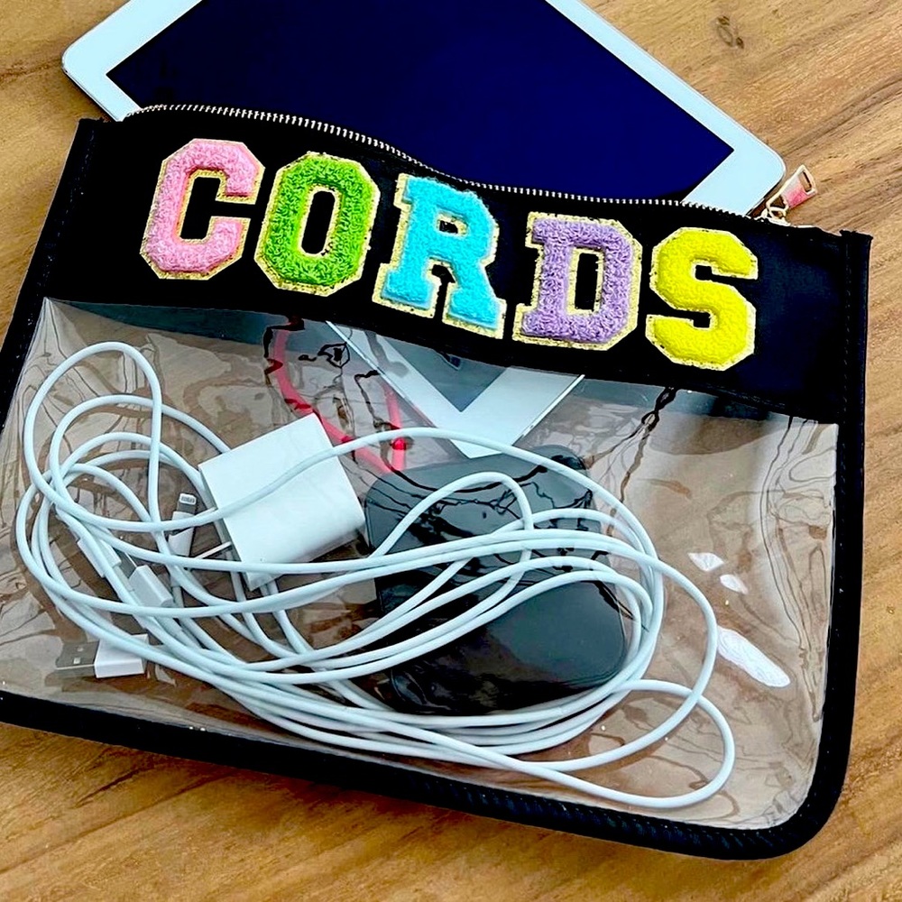 Black clear chenille pouch. Any phrase you would like up  to 5 letters.